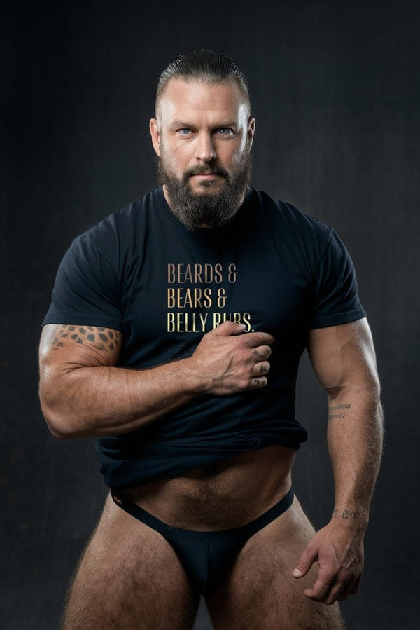 Muscular man wearing a black shirt with 'Beards Bears Belly Rubs' text, showcasing gay pride apparel.