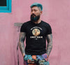 Tattooed man in black gay shirt featuring 'Do I Have a Type? Grey Hair' text.