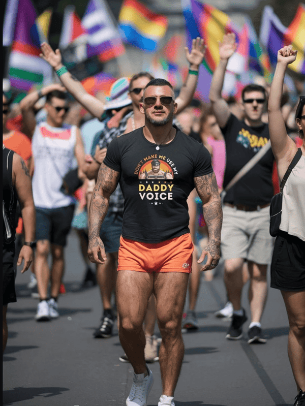 Gay pride parade featuring model in Donnèt Make Me Use My Daddy Voice - Dom Daddy Tshirt.