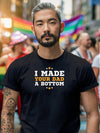 Model wearing a funny gay design shirt with text at a pride event.
