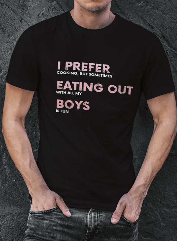 Funny Gay Shirt - I Prefer Cooking But Sometimes Eating out With The Boys Is Fun on a black t-shirt.
