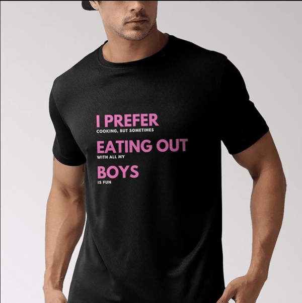 Funny Gay T-Shirt - I Prefer Eating Out Boys on a model wearing black cotton fabric.