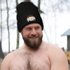 Gay Bear Embroidered Beanie Gay Hat LGBTQIA worn by a smiling man outdoors.