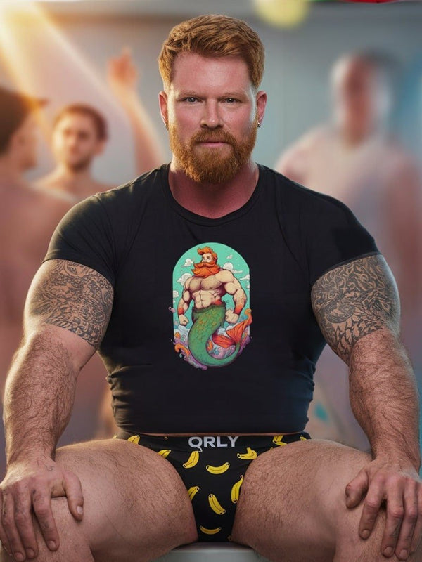 Model wearing a gay bear shirt with mermaid design and banana-patterned underwear.