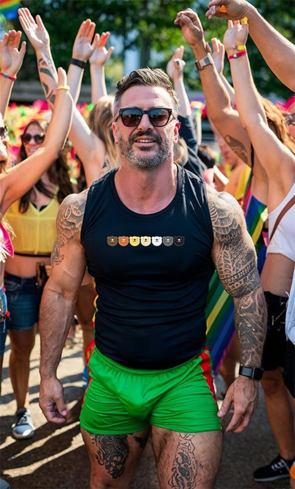 Muscular man in gay bear tanktop at pride event, surrounded by colorful celebration.