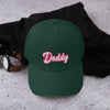 Green dad cap with embroidered 'Daddy' text, perfect for gay pride events.