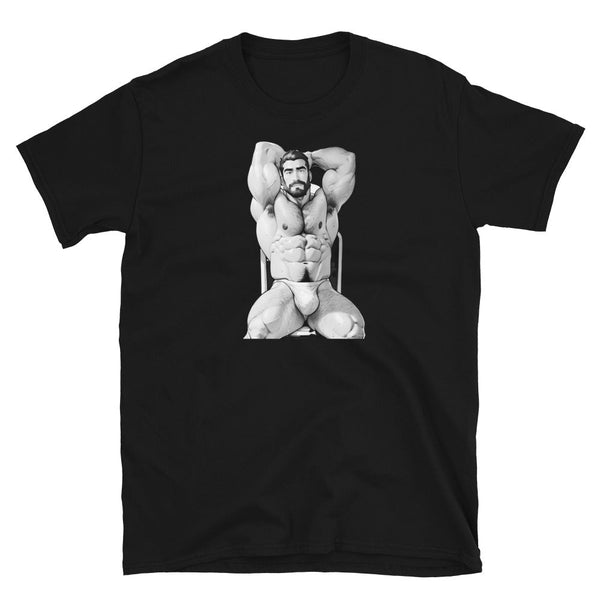 Gay Daddy Bear shirt featuring muscular man in chair, black cotton tee, pride apparel.