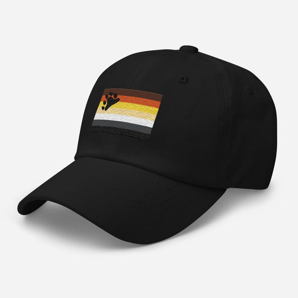 Black dad hat with embroidered gay pride bear paw design in rainbow colors.