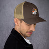 Brown trucker cap with hexagon design worn by man, perfect for pride apparel.