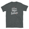 Dark heather gay shirt featuring 'I Turn masc into Bottoms' text design, LGBTQ pride apparel.