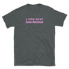 Funny pride shirt featuring text 'I Turn Mascs Into Bottom' on dark fabric.