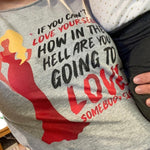 gray lgbtq graphic tee with a drag queen illustration and quote about self-love and acceptance