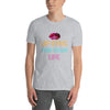 Model wearing a grey gay shirt with colorful 'Lip Sync For Your Life' graphic.
