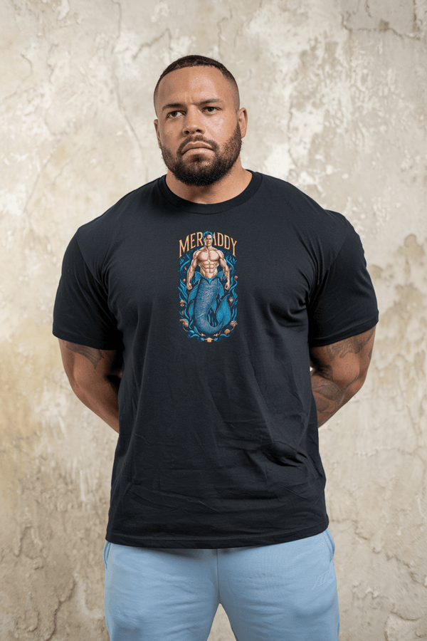 Merdaddy Shirt Gift for Dad Merman Mermaid Lover Mermaid Daddy Birthday Merdad on a muscular man in a navy shirt.