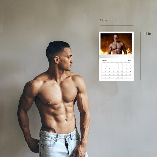 Muscular man with the Smokin' Hot: Firemen in Flames 2026 Calendar displayed.