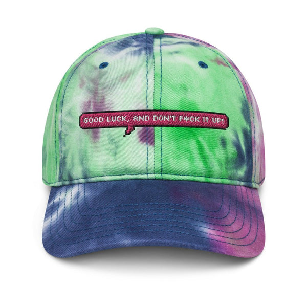 Tie dye cap featuring slogan 'Good Luck and Don't Fuck it Up', colorful design, LGBTQ pride apparel.