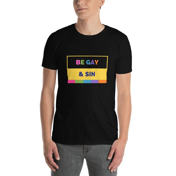Black t-shirt featuring colorful "BE GAY & SIN" design, LGBTQ+ pride apparel.
