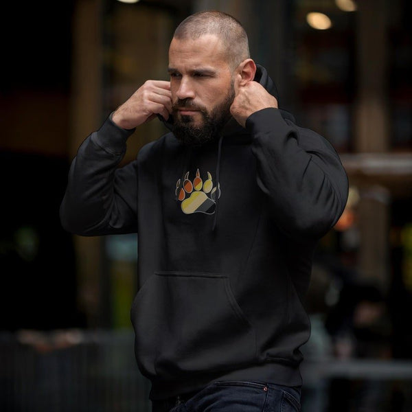 Man wearing Bear pride Hoodie with bear graphic, ideal LGBTQ gift.