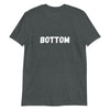 Dark gray shirt with bold white text reading 'BOTTOM', part of pride apparel.