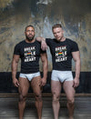 Two men in matching Break His Hole Not His Heart shirts, showcasing gay pride apparel.