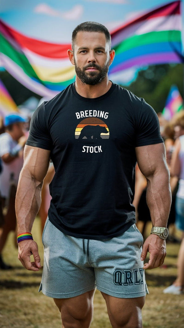 Muscular man in Breeding Stock Shirt at Pride event, gay pride apparel design.