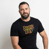 Model wearing Daddys Boy Shirt, a funny gay shirt in black with colorful lettering.
