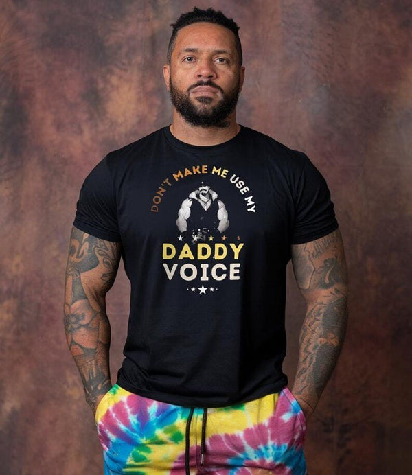 Man wearing black funny gay shirt with 'Don't Make Me Use My Daddy Voice' design.