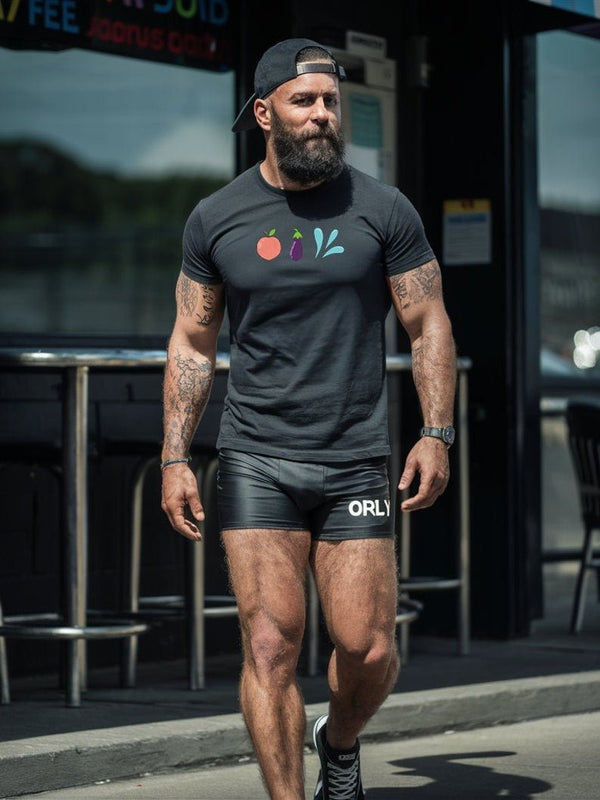 Model wearing a black funny gay t-shirt with colorful graphics, showcasing gay pride apparel.