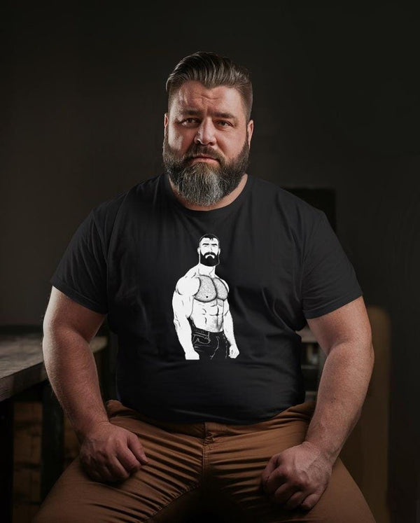 Muscle bear pride shirt featuring a strong cartoon design on a black background.