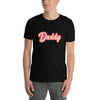 Model wearing a black Gay Dad Shirt Gay Daddy T-Shirt with pink lettering.