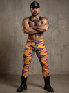 Model wearing colorful Naughty Fruit leggings as gay pride apparel.