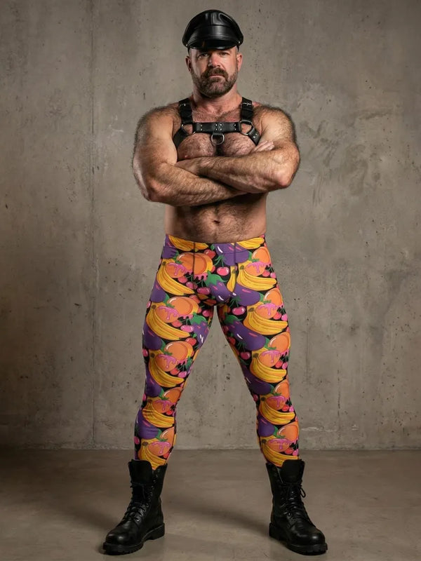Model wearing colorful Naughty Fruit leggings as gay pride apparel.