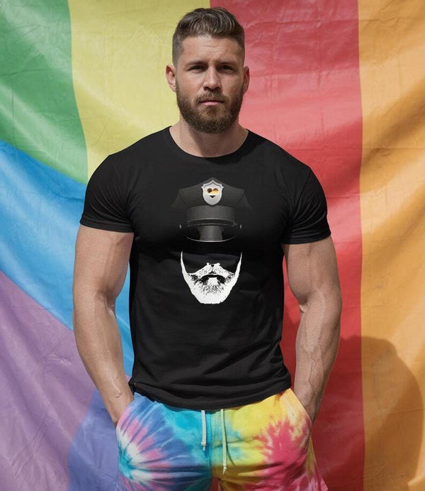 Model wearing a black gay leather shirt with a bear graphic against a rainbow background.