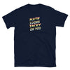Navy shirt with colorful text saying 'HATE LOOKS TACKY ON YOU', LGBTQ pride apparel.