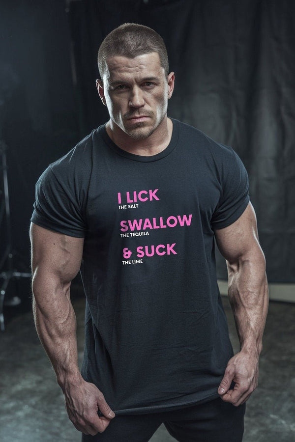 Model wearing a I Lick Suck & Swallow & Suck Tequila T-Shirt, showcasing a funny gay shirt design.