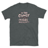 Dark grey t-shirt featuring text: I'm Too Clumsy To Be Around Fragile Masculinity, feminist empowerment.