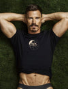 Muscle Gay Bear on the moon Art Shirt worn by man, featuring gay pride design.