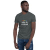 Model wearing a dark grey proud friend & ally t-shirt, showcasing LGBTQ pride apparel.