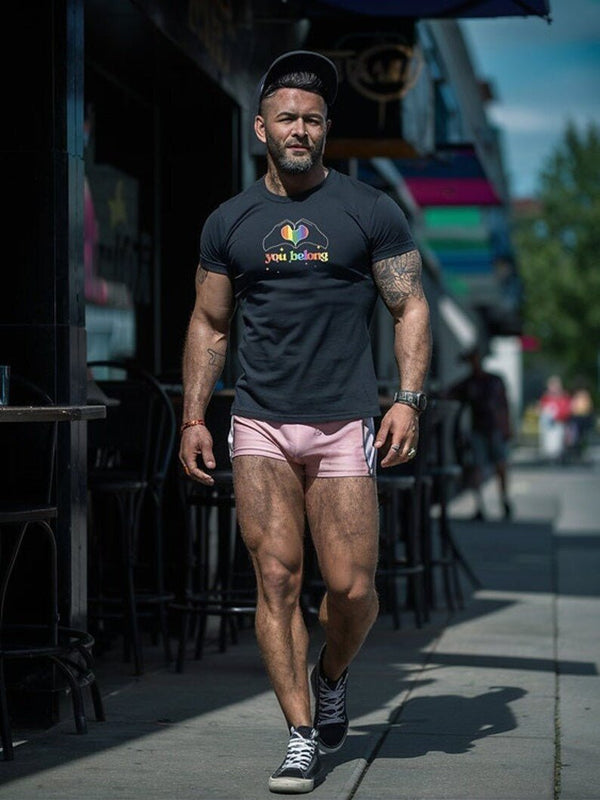 Muscular man in black t-shirt walking, showcasing You Belong Gay Straight Proud Ally Gay Pride Support LGBT T-Shirt.